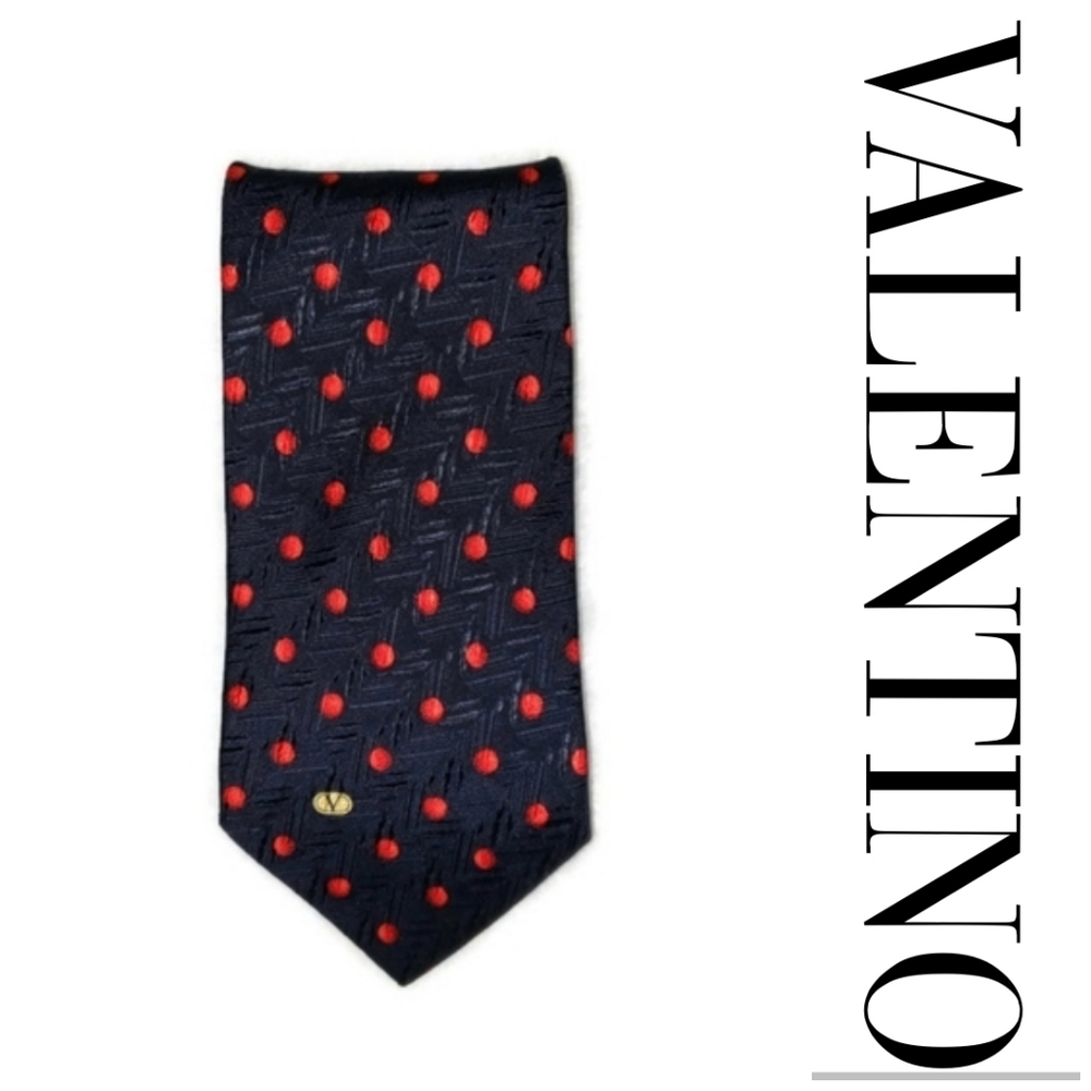 Valentino silk tie navy background with red circle pattern with front gold logo